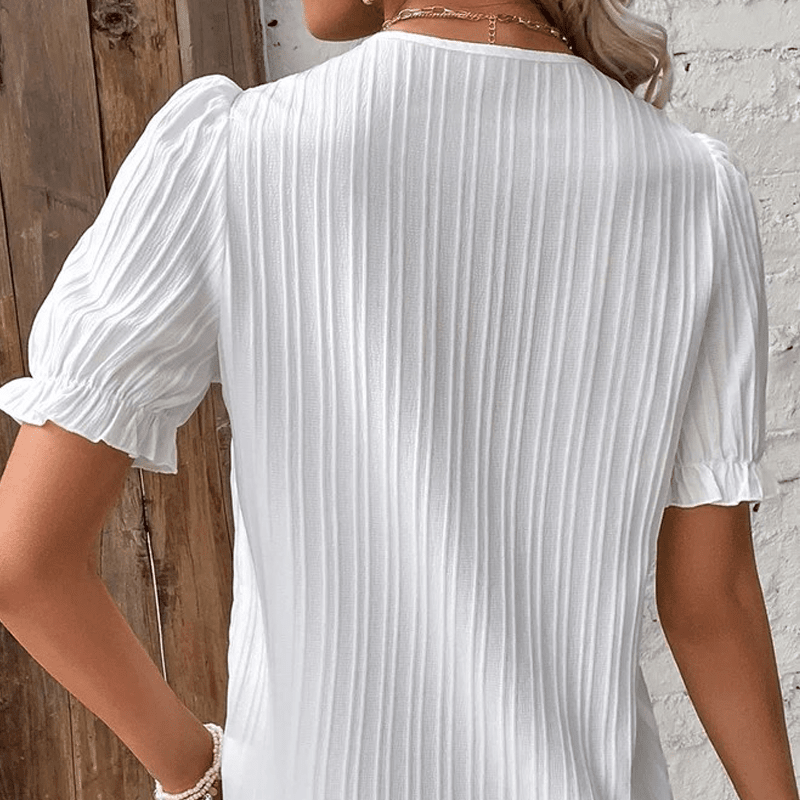 Elegante Bluse mit V-Ausschnitt und schlichter Spitze